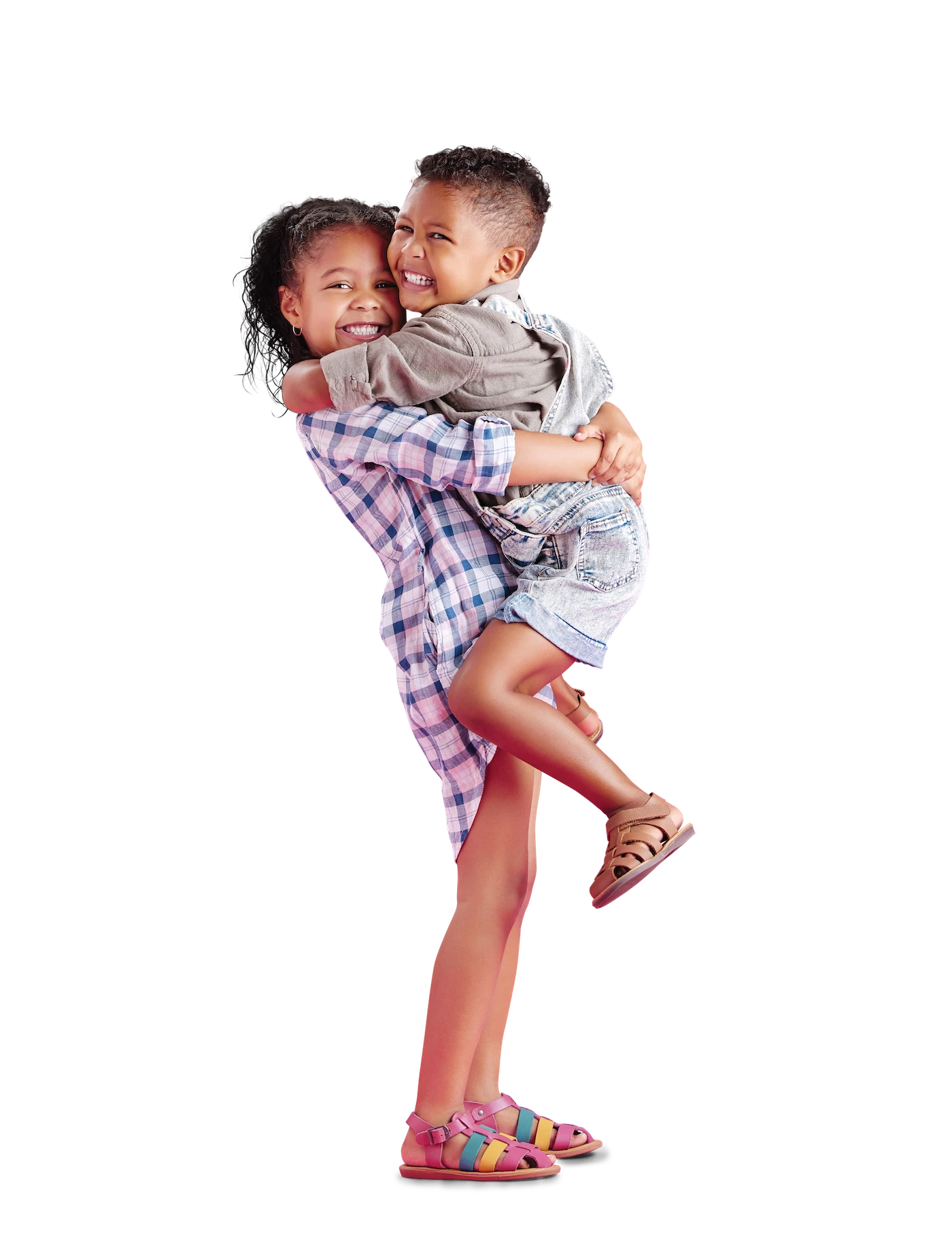 A girl and boy hugging and smiling