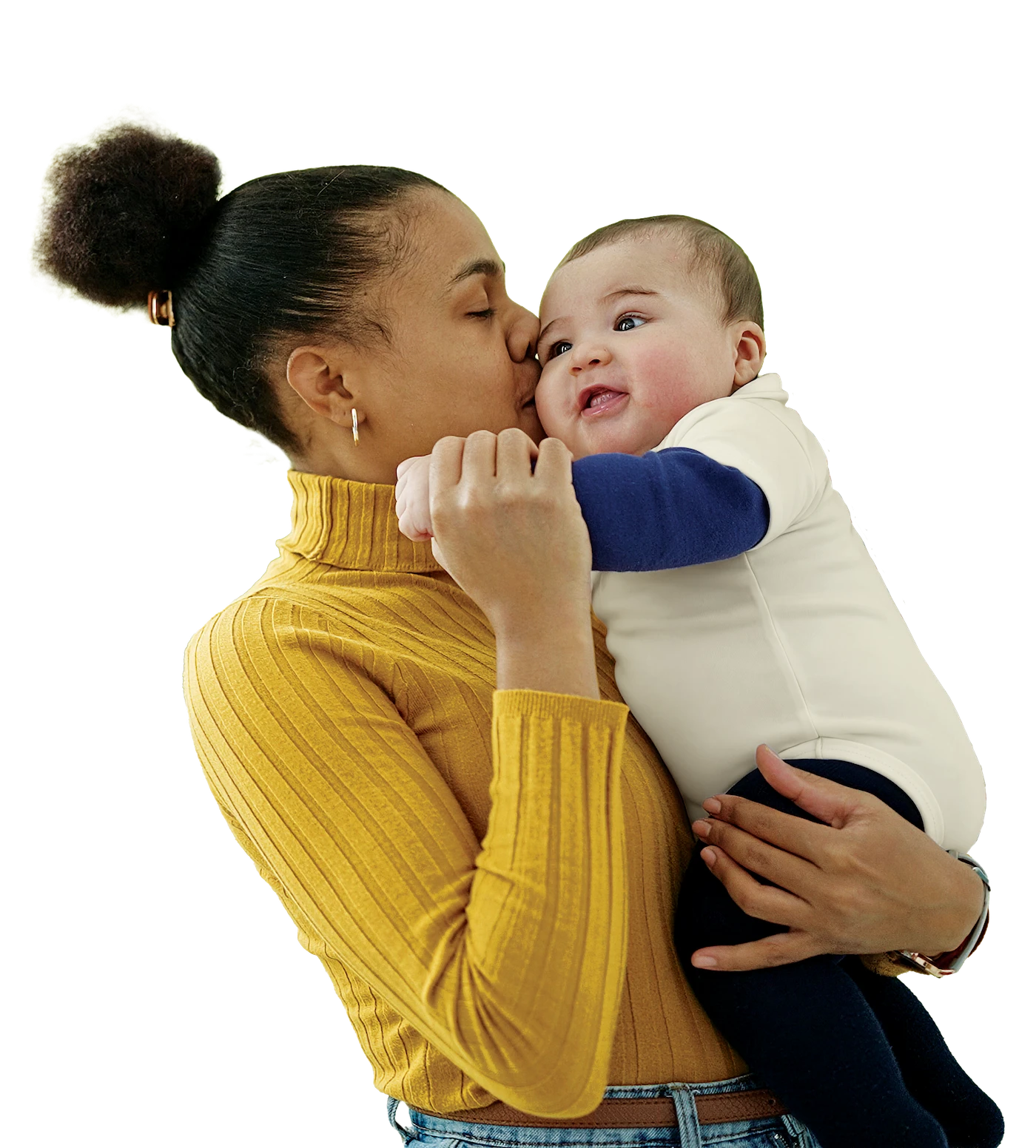 Mother kissing her infant