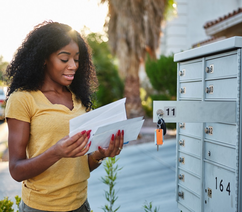 woman at mailbox