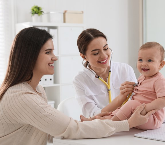 happy baby at the doctor