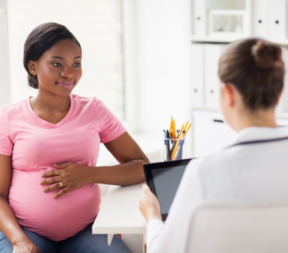 Pregnant woman at prenatal appointment 